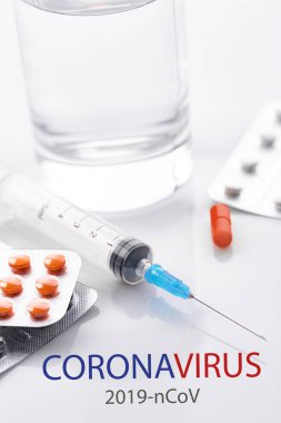 Coronavirus 2019-nCoV. Novel coronavirus, Middle East Respiratory Syndrome. Pills with CORONAVIRUS text. Chinese coronavirus outbreak. Virus Pandemic Protection Concept