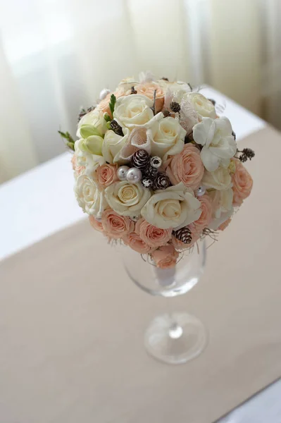 Bouquet of  pink and white roses on the table near the window Stock Picture