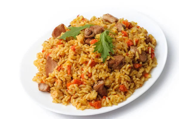 Pilaf de arroz con carne y verduras vista superior en un plato. Aislar —  Fotos de Stock