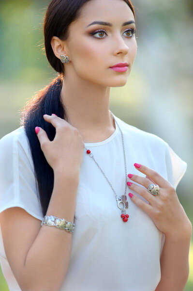 long hair beautiful woman. Model with luxury accessory and jewel