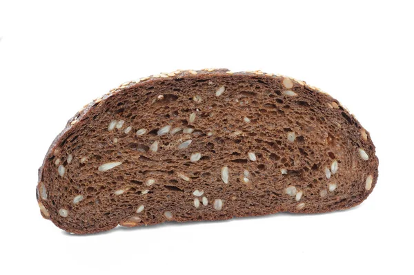 Fatia de pão de centeio preto. Vista de perto — Fotografia de Stock