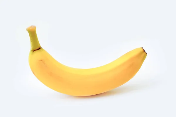 Banana gialla su sfondo bianco — Foto Stock