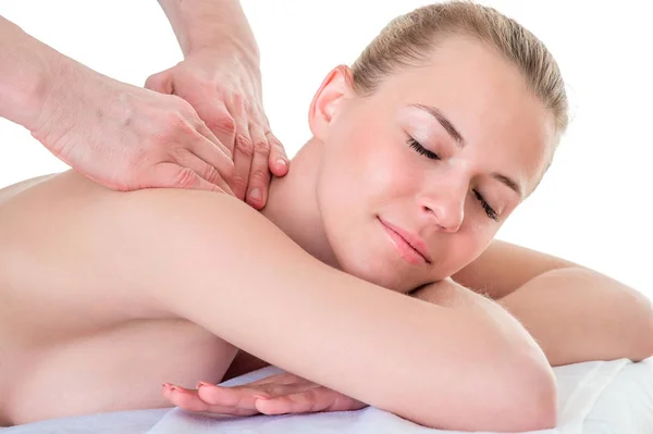 Werken met de patiënt, zijn schouders masseren massagetherapeut. — Stockfoto