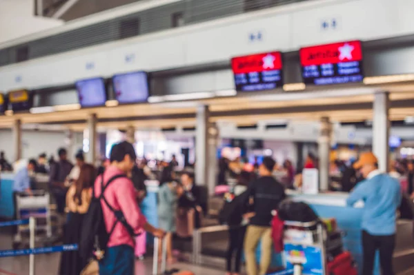 Bild verschwommen für Hintergrund abstrakt und kann Abbildung zu Artikel von Menschen in Flughafen sein — Stockfoto