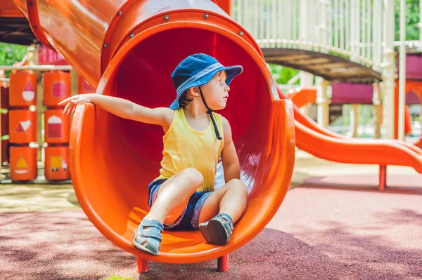 Little kid boy playing at playground. — Stock Photo, Image