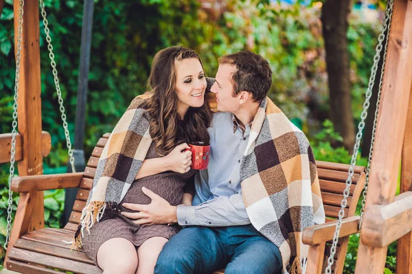 Pregnant young woman and her husband. — Stock Photo, Image