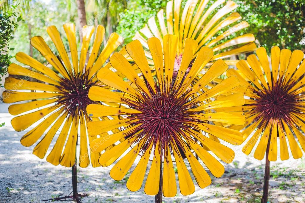 Recycled colorful plastic flowers — Stock Photo © galitskaya 149129953