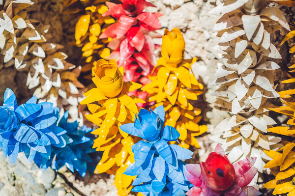 Recycled colorful plastic flowers