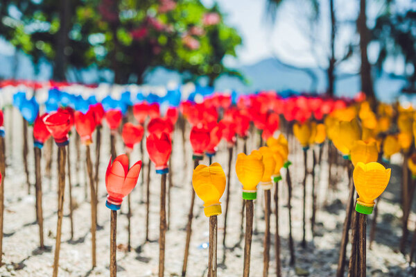 Recycled colorful plastic flowers