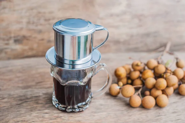 Vietnamese coffee in glass cups, traditional metal coffee maker phin. Black drip  coffee as famous in Vietnam 25499474 Stock Photo at Vecteezy