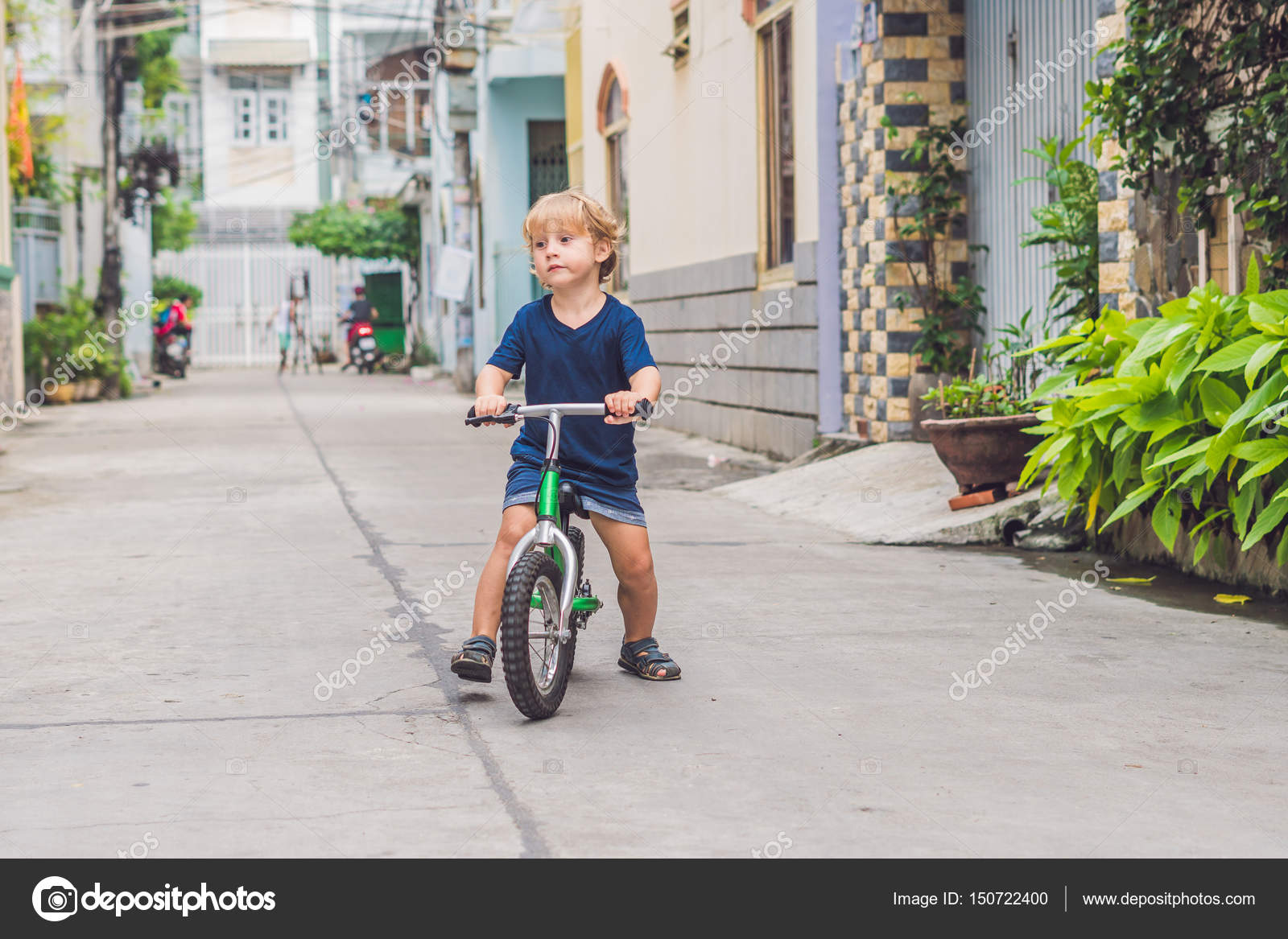 children driving bike