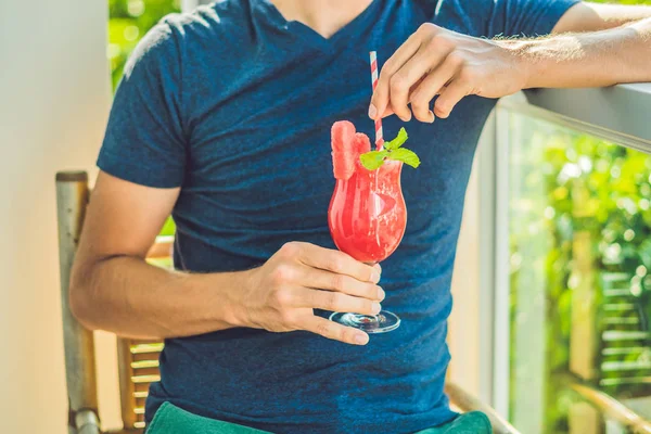 Man is holding  watermelon smoothie — Stock Photo, Image