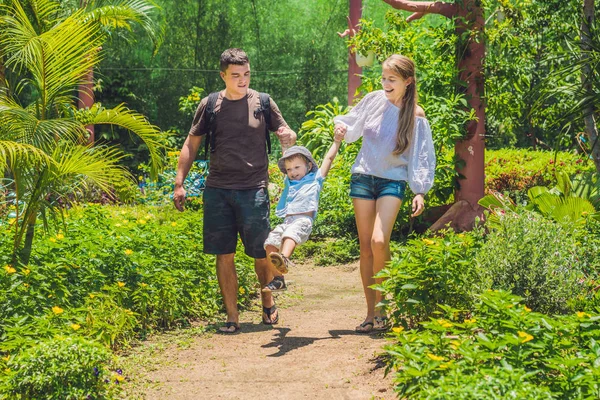 Happy young family spending time outdoor — Stock Photo, Image