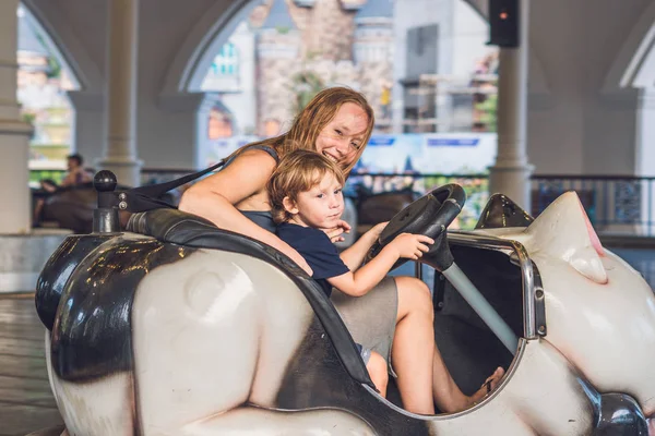Mom and son having a ride — Stock Photo, Image