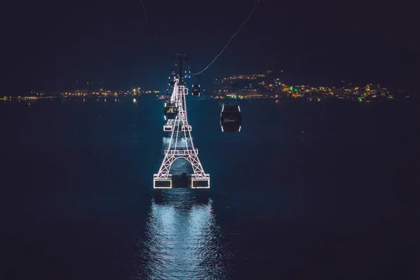 Night cable car over sea — Stock Photo, Image