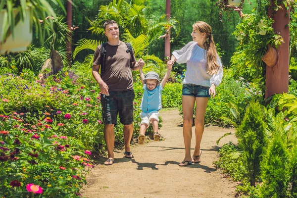 Happy young family spending time outdoor — Stock Photo, Image