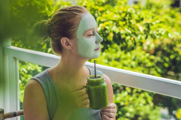 Woman applying Facial green clay Mask — Stock Photo, Image