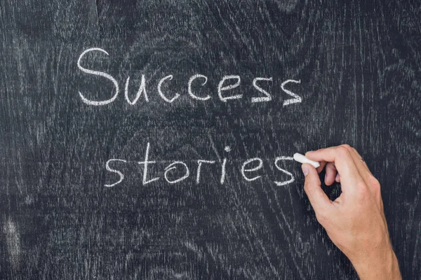 Success stories written on the blackboard
