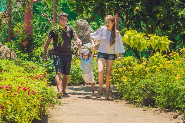 Young family spending time outdoor — Stock Photo, Image