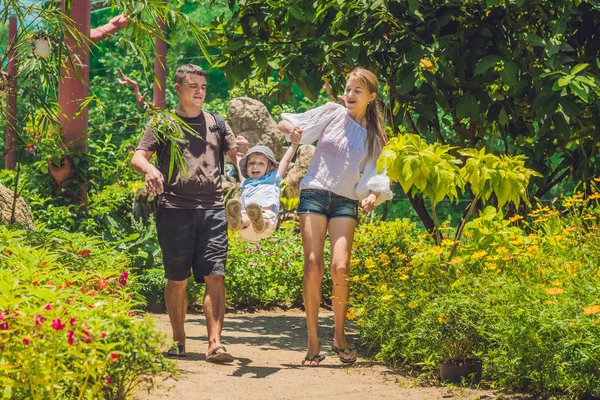 Young family spending time outdoor — Stock Photo, Image