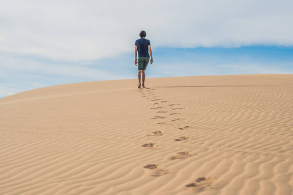 man is walking in the desert Vietnam