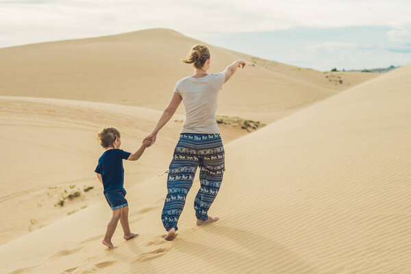 Mom and son in the desert.