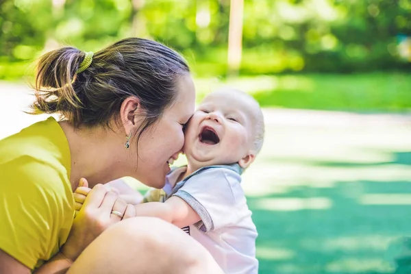 Young mother and her toddler son — Stock Photo, Image