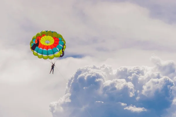 Young woman flies on a parachute — Stock Photo, Image