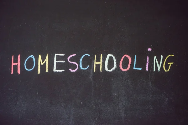 Homeschooling woord op blackboard — Stockfoto