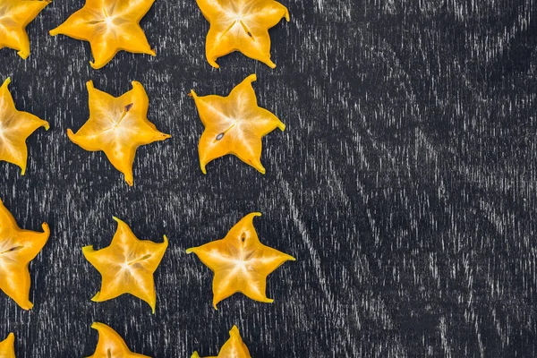 Star fruits on wooden table — Stock Photo, Image