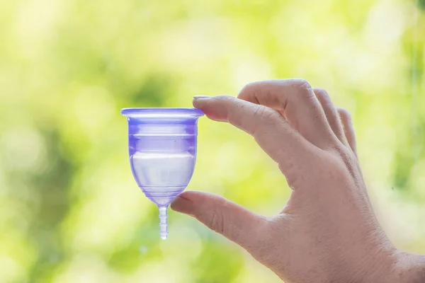 Woman holding menstrual cup — Stock Photo, Image