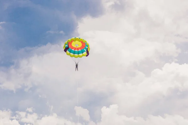 Young woman flies on a parachute — Stock Photo, Image