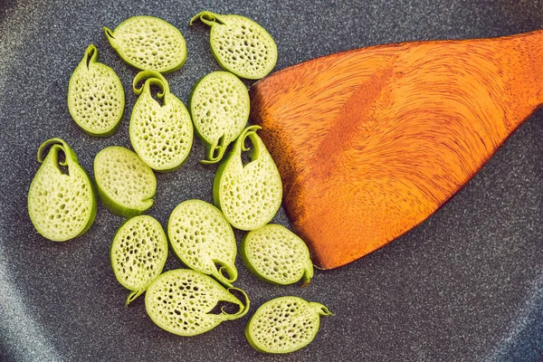 Unusual Asian edible plant. Porous inside. Vietnamese lulis eat