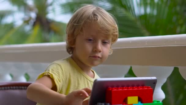 Boy Tropics Talking Friends Family Video Call Using Tablet — Stock Video