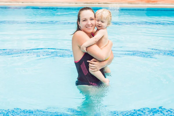 Young Mother Teach Her Little Son How Swim Swimming Pool Royalty Free Stock Photos