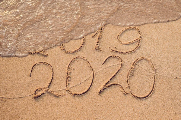New Year 2020 Coming Concept Inscription 2019 2020 Beach Sand Stock Photo