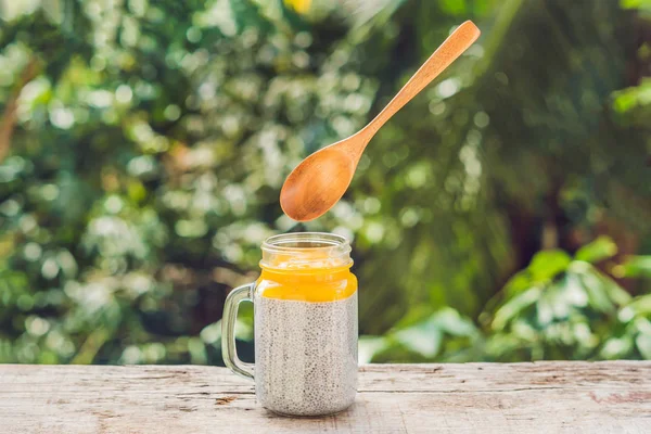 Chia Seed Pudding Almond Milk Fresh Mango Topping Levitating Spoon — Stock Photo, Image
