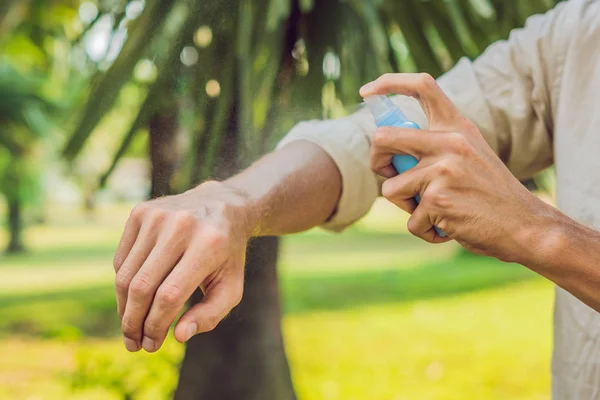 Young Man Spraying Mosquito Insect Repellent Forest Insect Protection — Stock Photo, Image