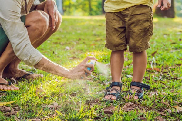 Closeup Shot Dad Son Use Mosquito Spray Spraying Insect Repellent Stock Photo