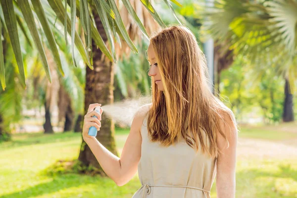 Woman Spraying Insect Repellent Skin Outdoor Daytime — Stock Photo, Image