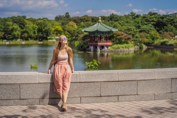 Woman tourist in korea. Korean palace grounds in Seoul, South Korea. Travel to Korea concept