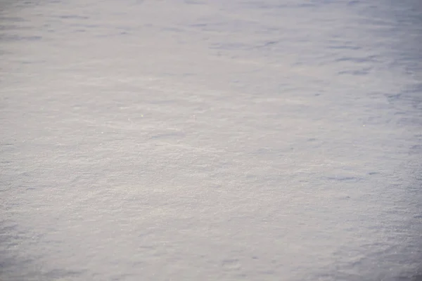 Neve pura e intocada branca. Textura de neve branca com sombras — Fotografia de Stock