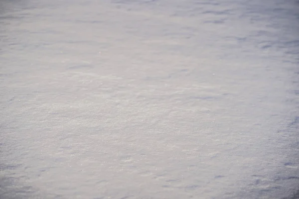 Neve pura e intocada branca. Textura de neve branca com sombras — Fotografia de Stock