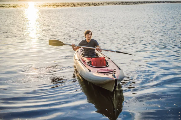 Summer Travel Kayaking. Man Paddling Transparent Canoe Kayak, Enjoying Recreational Sporting Activity. Male Canoeing With Paddle, Exploring Sea On Vacation. Rowing Water Sports — Stock Photo, Image