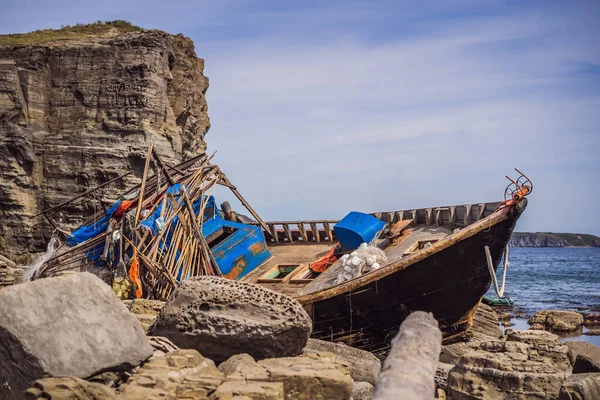 Korean fishing boats washed ashore at Tobizin Cape, Russian Island, Vlaivostok