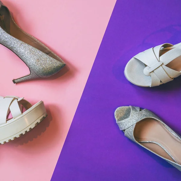 womens high heel shoes and sandals on ultra violet and pink background. fashion trend. minimal. flat lay