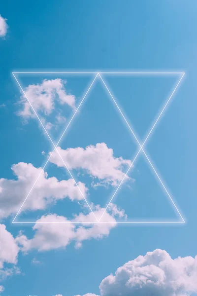 Aesthetic art collage with beautiful blue sky and triangle light frames. Minimal concept