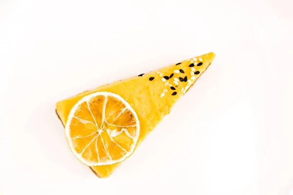 Isolated piece of lemon cake on a white background — Stock Photo, Image