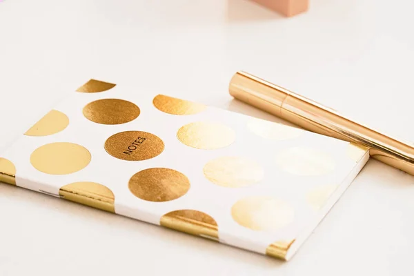 Woman's glamour golden dots notepad — Stock Photo, Image