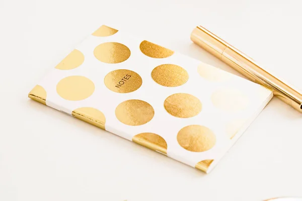 Woman's glamour golden dots notepad — Stock Photo, Image